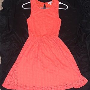 Delia’s orange dress